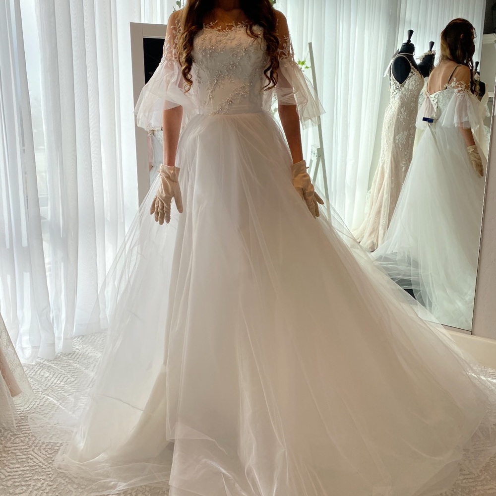 Whimsical White Off-Shoulder Wedding Dress